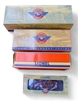 Four Boxed Lionel Train Cars / Engines.