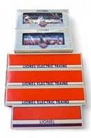 Seven Boxed Lionel HO Scale Trains.