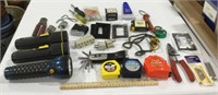 Tool lot w/ flashlights, tape measures & outlet