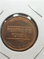 Nik-o-lok restroom token