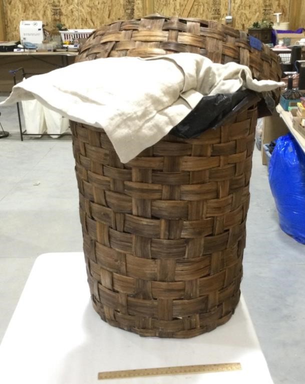 Wicker laundry hamper w/pillows, throws & clothes