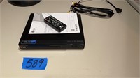 LG DVD player with remote 
turns on /ejects