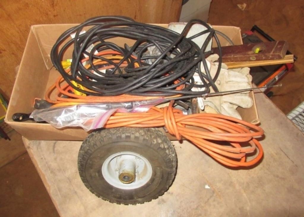 Assorted extension cords, levels, work gloves,