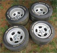 Set of (4) racing tires with rims includes