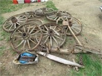 (7) Antique wagon wheels and axles.