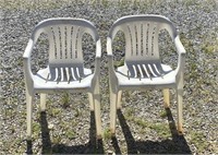 (2) Plastic patio chairs