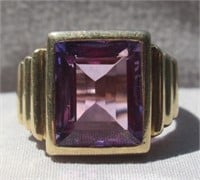 10K Yellow gold ring with purple center stone.