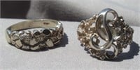(2) Sterling silver rings.