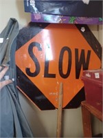 Metal Slow Street Sign on Pole