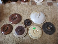 Lot of misc crock lids see photos