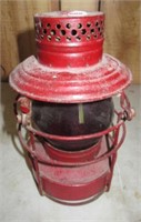 Red globe antique railroad lantern.