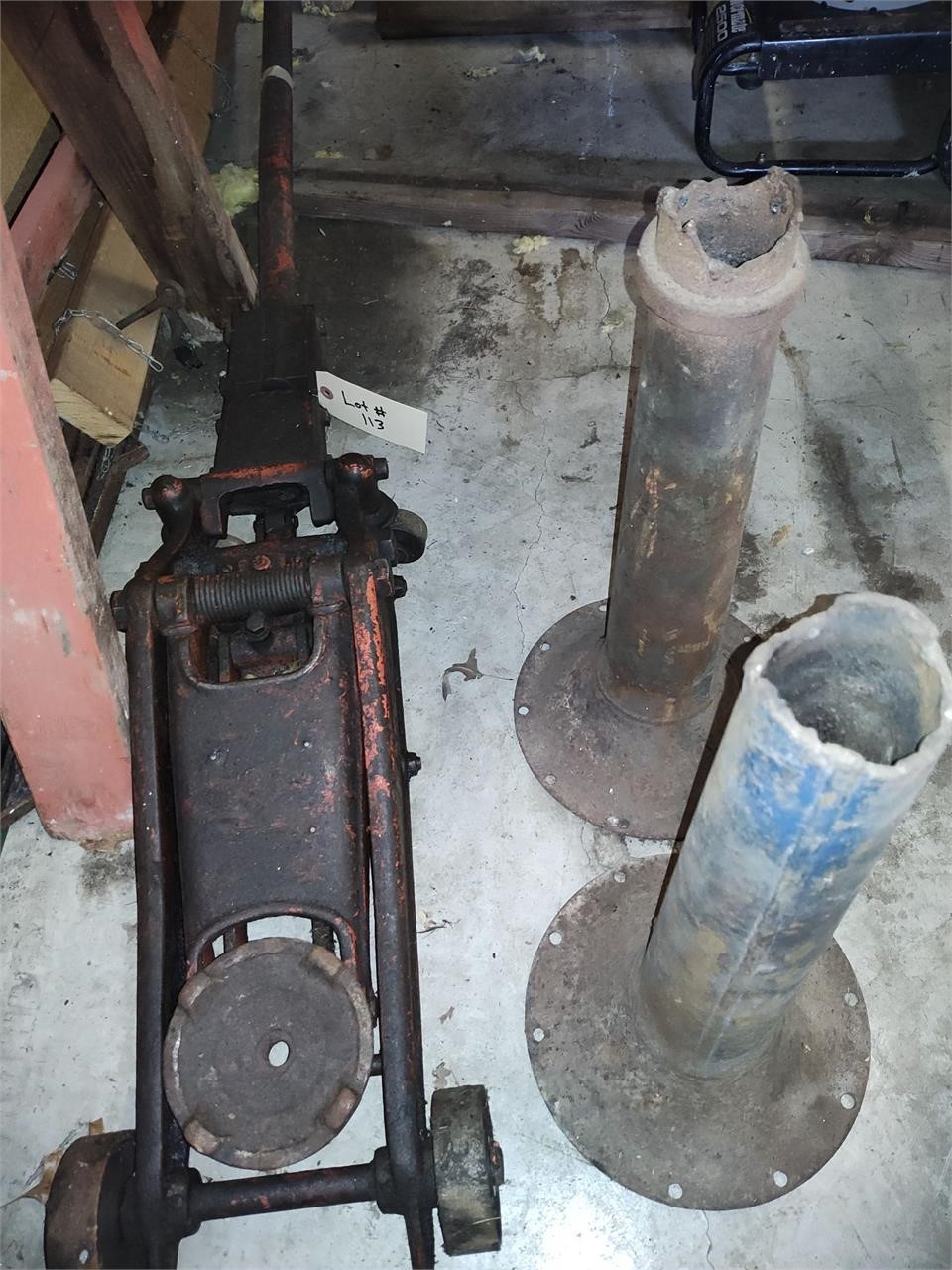 Antique Marquette Floor Jack and stands.