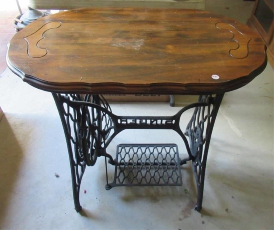 Table with sewing machine base.