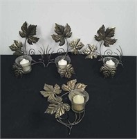 Vintage wall candle holders with candles