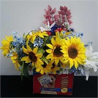 Box of artificial flowers