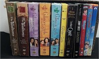 A group of DVD movies including seasons of The