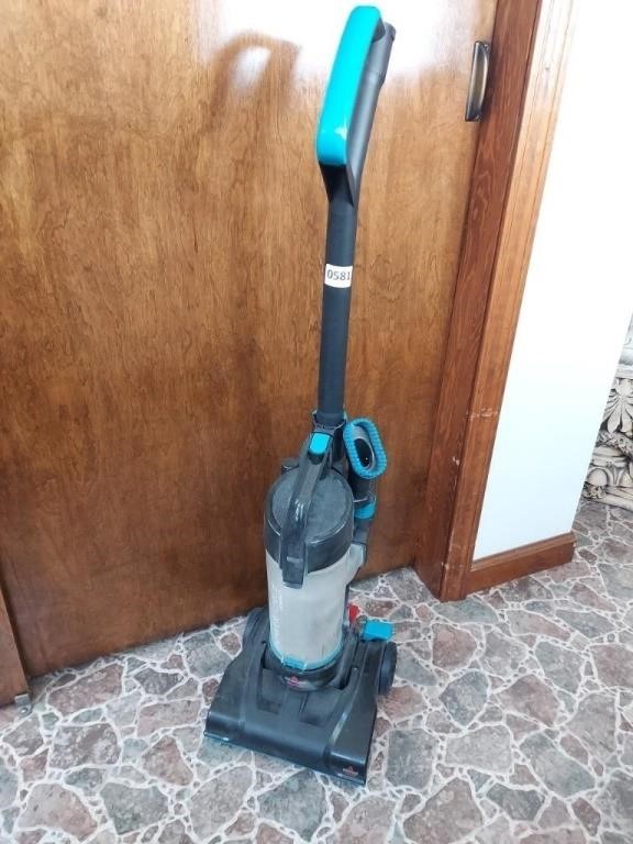 Bissell Vacuum.  Plugged In and Turns On