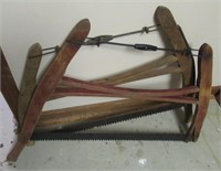 (2) Antique hand saws.