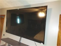 65" LG Flat Screen TV with Remote.  TV is Mounted