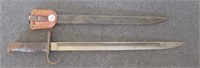 Antique bayonet with metal sheath. Blade