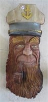 Hand carved wood sea captain. Measures: 29" tall.