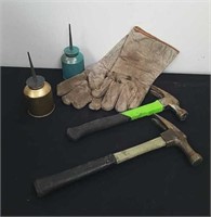 Two vintage claw Hammers and two vintage oil cans