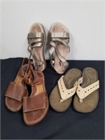 2 pairs of size 7 sandals and one pair of