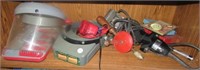 Contents of shelf that includes jewelers tools,