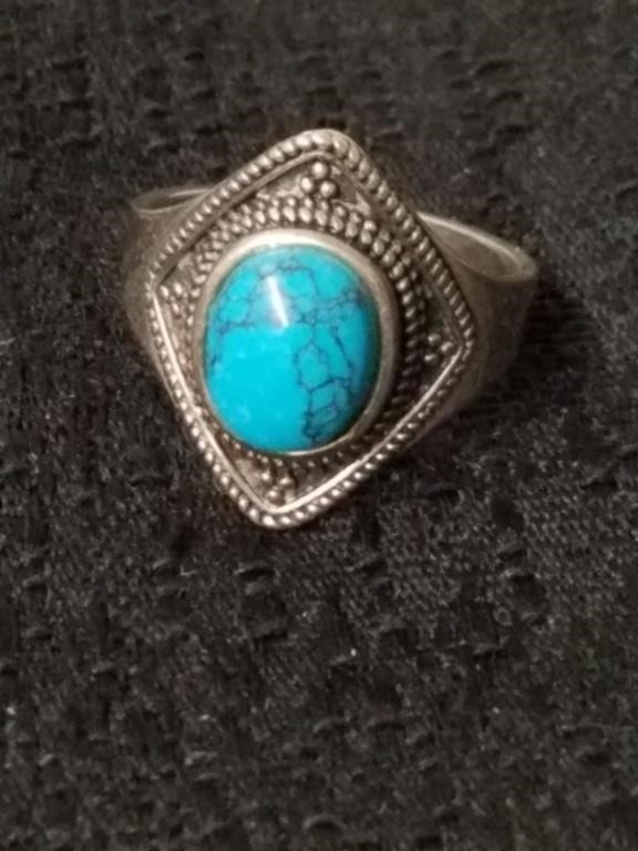 Size 8 and 1/2 ring stamped s925 with turquoise