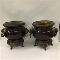 Pair Of Urns With Lion Head Handles