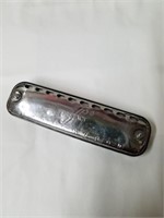 Vintage First Act harmonica