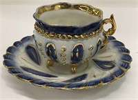 Blue And Gilt Porcelain Cup And Saucer