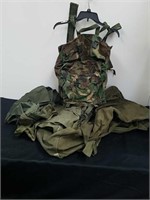 Three large military duffle type bags and
