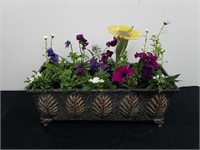 18x7x 6.75 in plastic planter with flowers and a