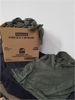 Box full of miscellaneous size military shirts