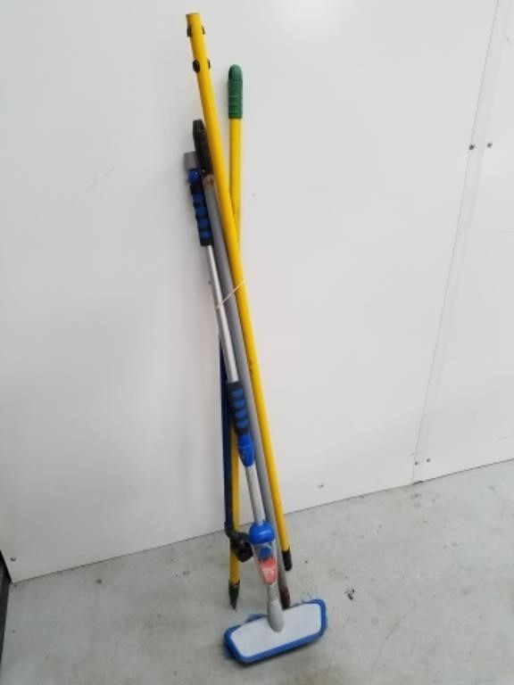 Scrubby brush with hose attachments and poles