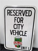 Metal reserved for City Vehicle Caldwell parking
