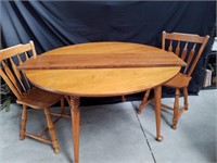 Wooden one leaf  table w/two chairs is 29.5 x 48