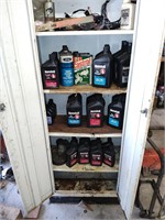 Metal cabinet with contents of new oil
