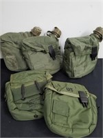 Three military two quart canteens with covers and