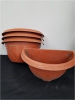 Four 14.5 x 8.5 x 7.5 in wall pocket planters