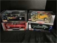 Four Boxed 1/18 Inch Scale Die Cast Vehicles.