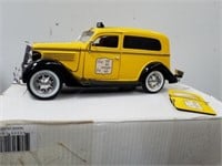 Diecast replica of 1935 Ford Sedan Delivery taxi