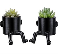 Faux succulents in modern funky planters