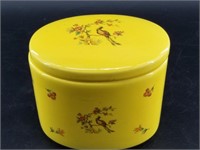 Bright yellow porcelain trinket box with fantastic