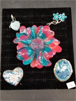 Jewelry display with multiple brooches and pendant