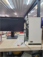 RGB lighting gaming computer and Asus monitor