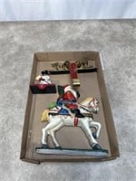 Cast iron Santa on horse vintage door stop and