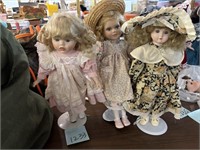 Porcelain dolls on stands