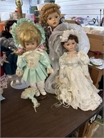 Porcelain dolls on stands